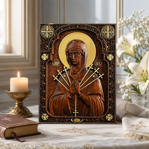 Our Lady of Sorrows wooden icon displayed with candlelight and Bible in a peaceful Catholic prayer setting