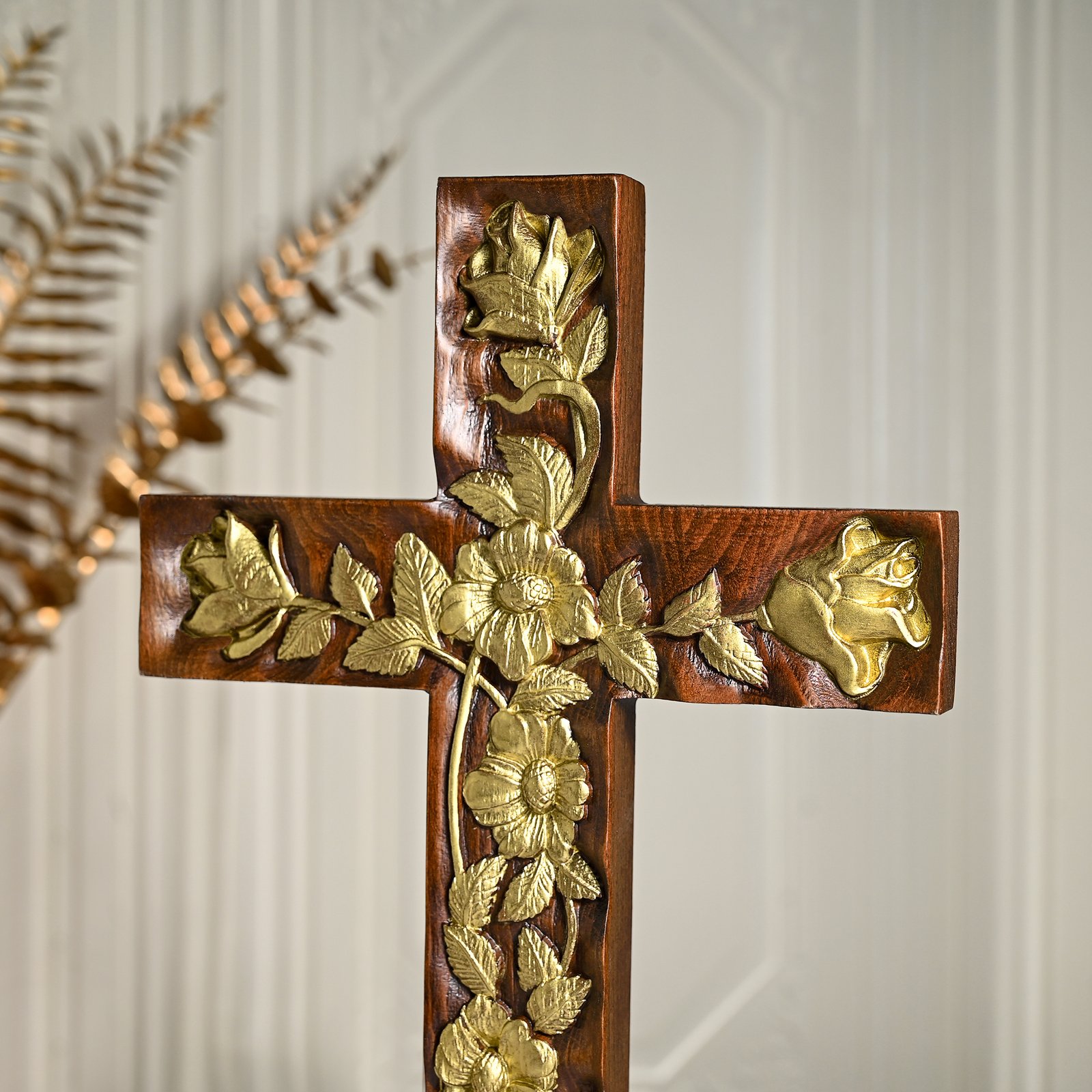 Close up Rose Cross flower carving showing detailed rose petals and handcrafted wooden artwork