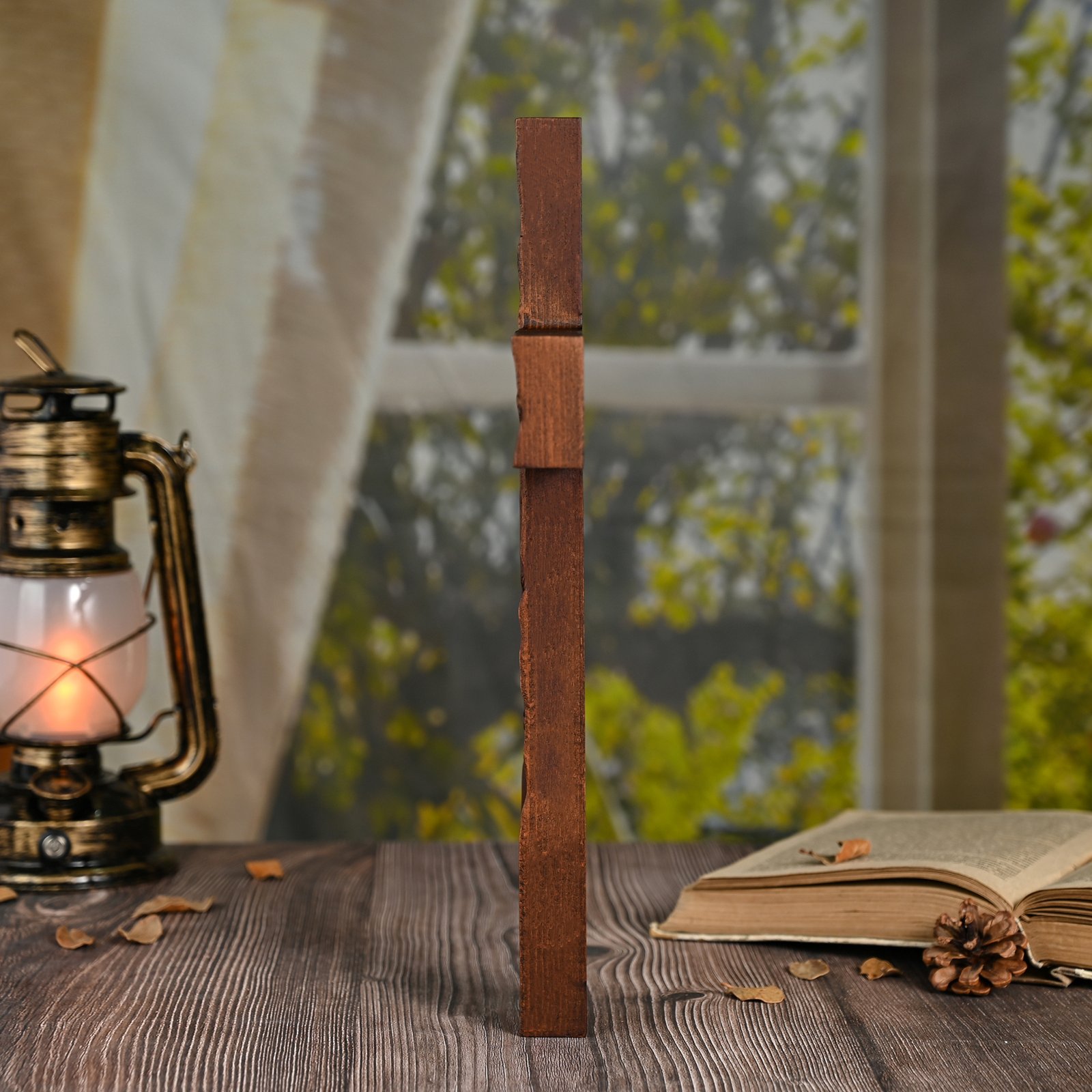Rose Cross wooden sculpture side view showing wood thickness and handmade carving details