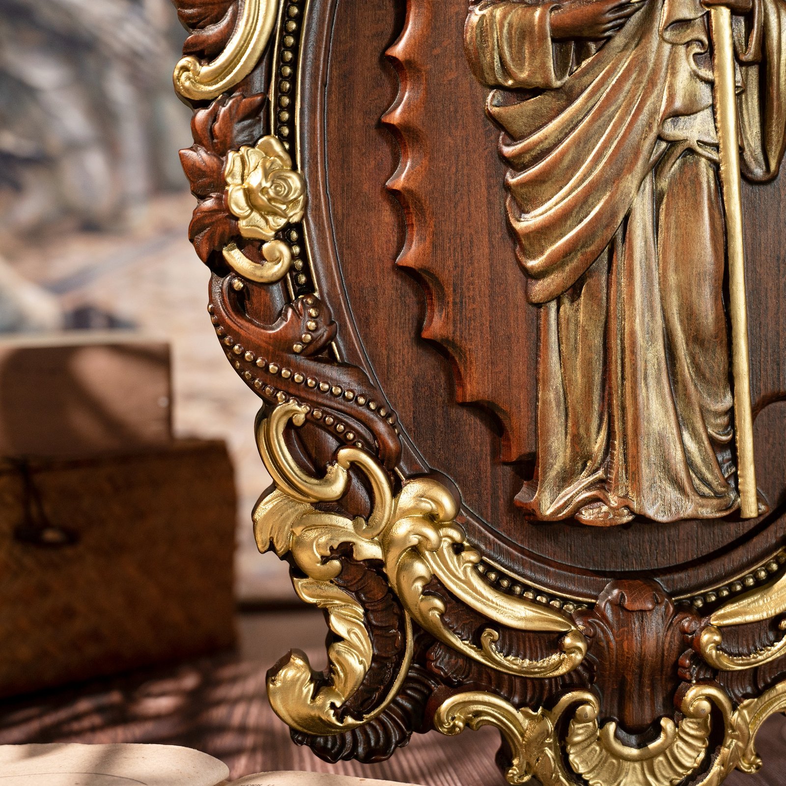 Close up of Saint Jude wooden relief showing ornate carved frame details and handcrafted craftsmanship