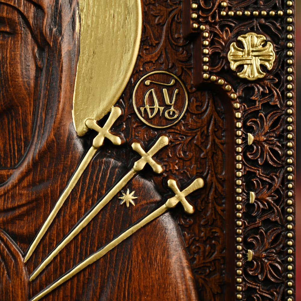 Seven Sorrows of Mary icon close up showing golden swords symbolizing Mary's seven sorrows