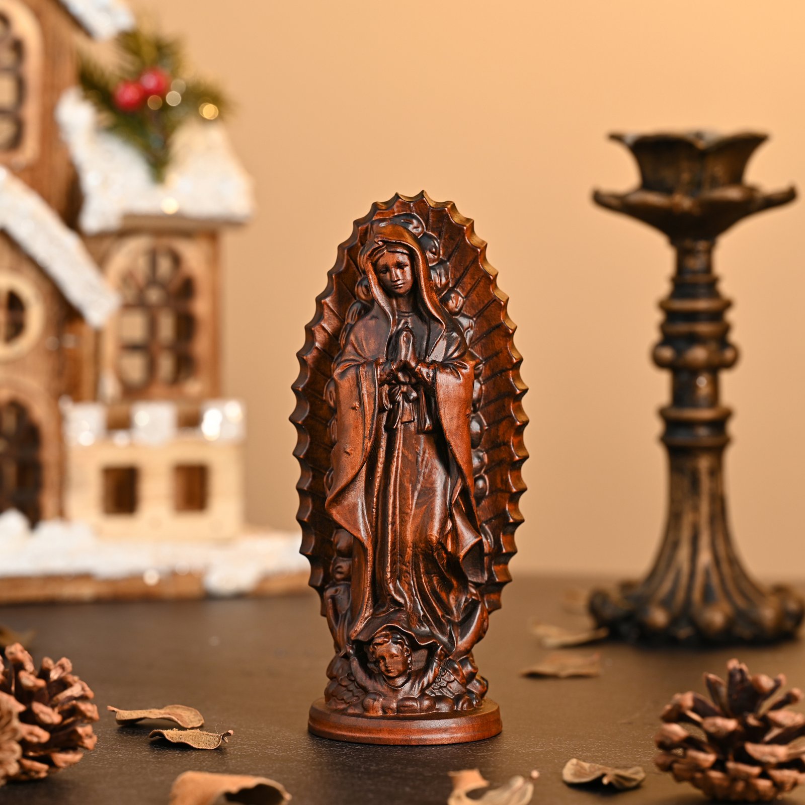 Wooden Virgin Mary statue displayed in a warm devotional interior, handmade religious wood carving decoration