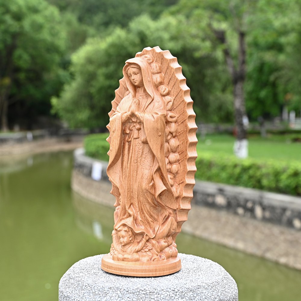 Wooden Virgin Mary statue side angle showing intricate carved details, traditional religious artwork