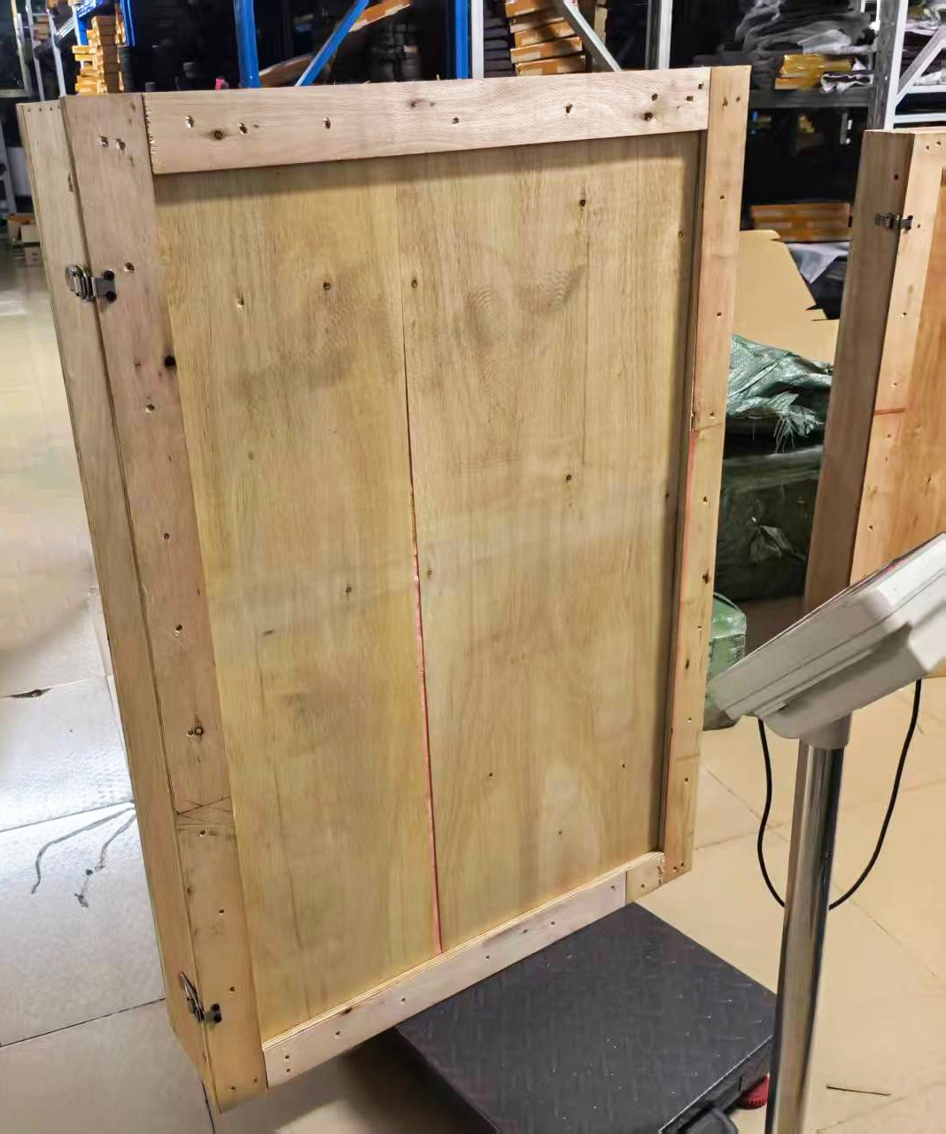 Rigid wooden shipping crate prepared for a large religious carving
