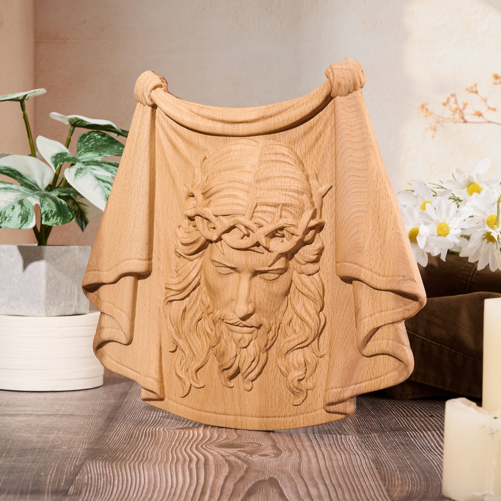 Light natural finish Jesus face wood carving featuring a draped veil design and Christian symbolic details
