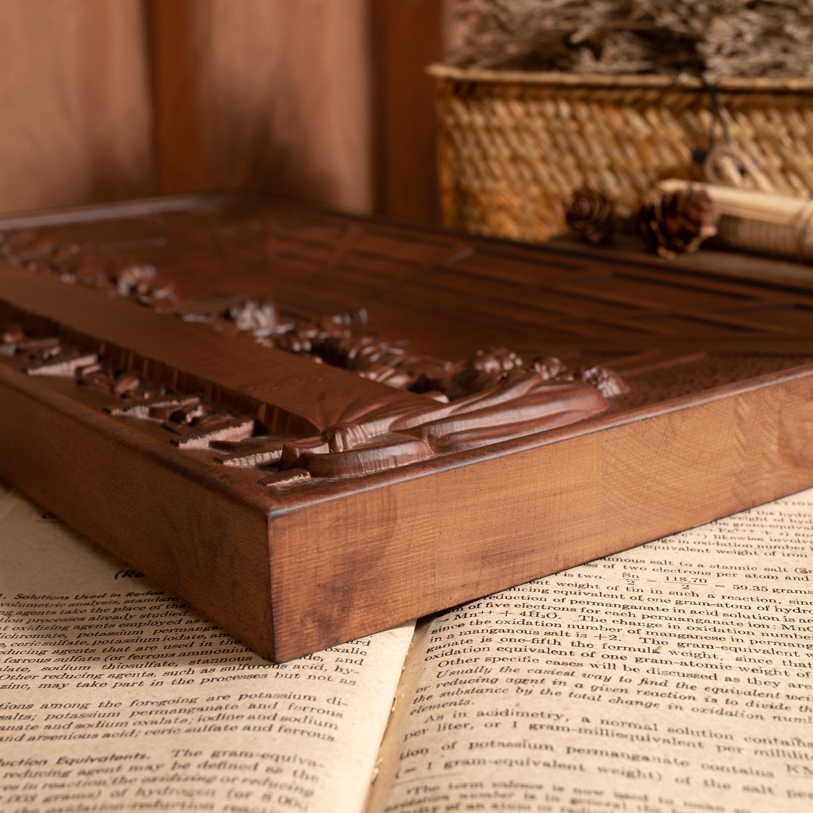 Side detail view of the Last Supper wooden relief plaque showing the carved thickness and layered wood construction